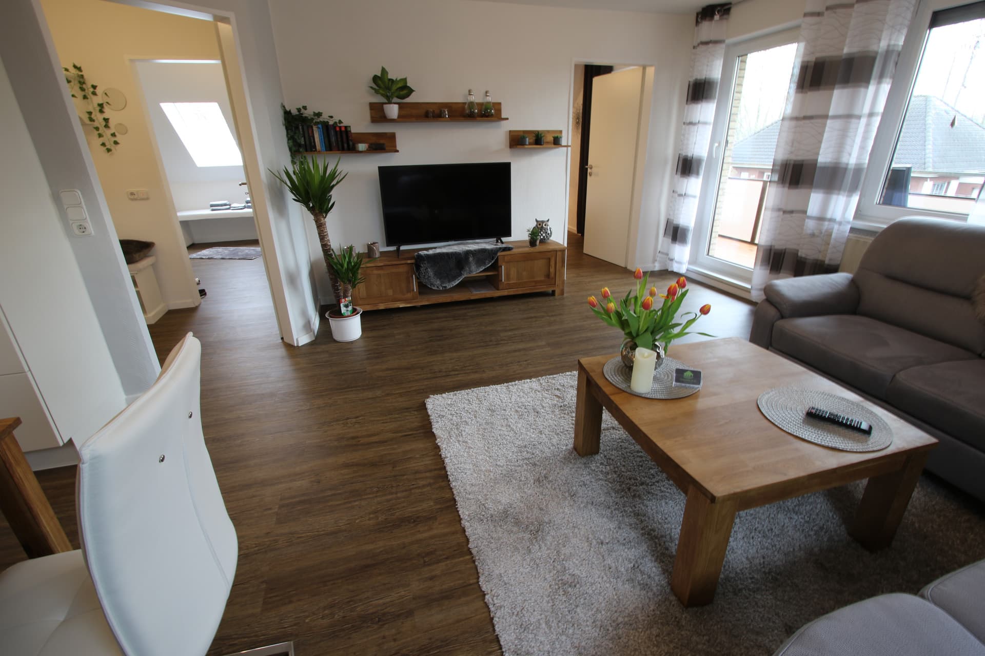 Woonkamer van vakantiewoning Am See 2 in Rhauderfehn