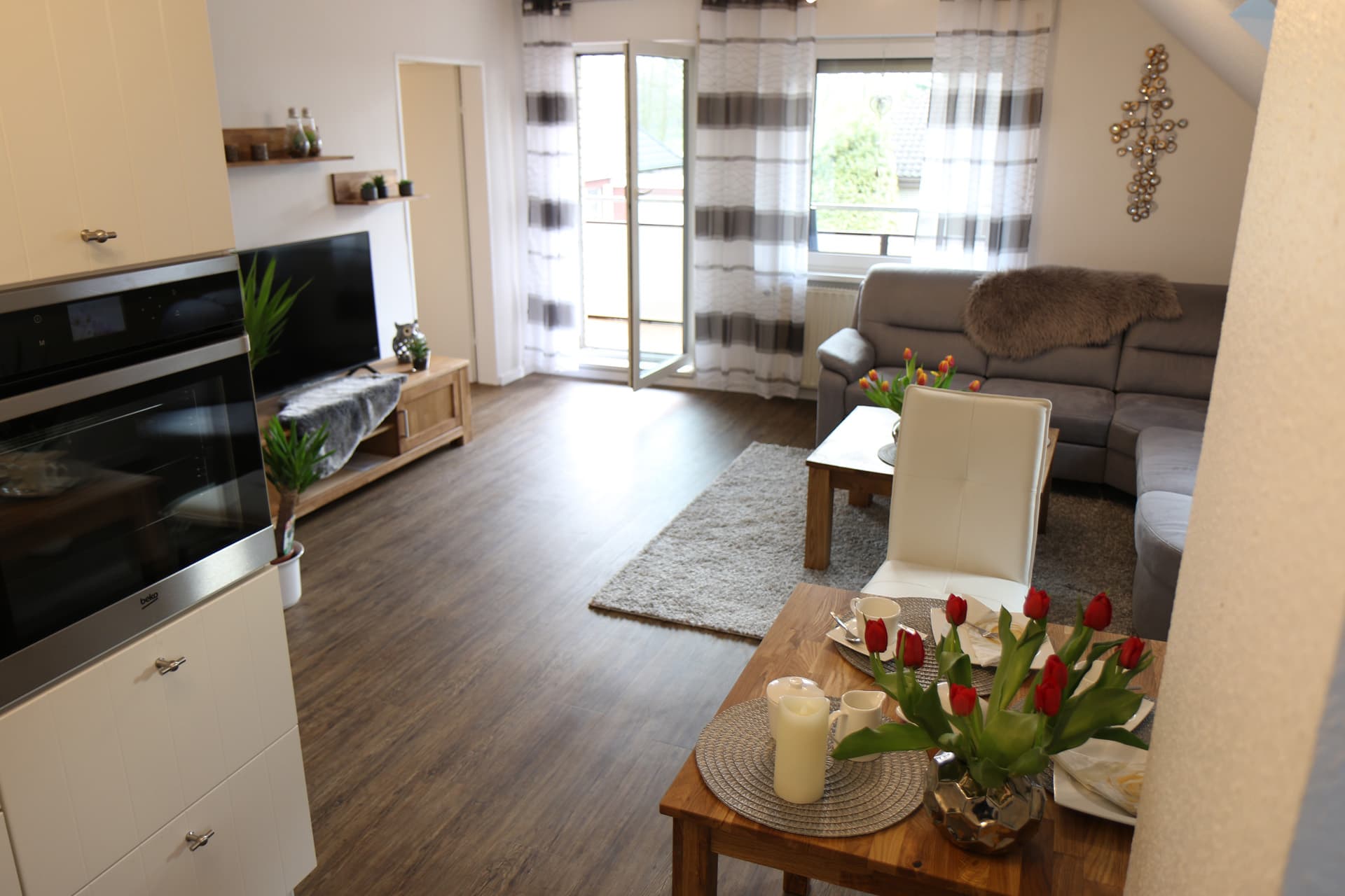 Uitzicht op het balkon van vakantiewoning Am See 2 in Rhauderfehn